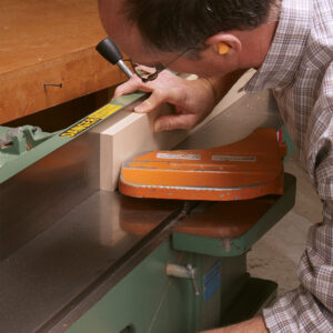 turn off the jointer and raise the table